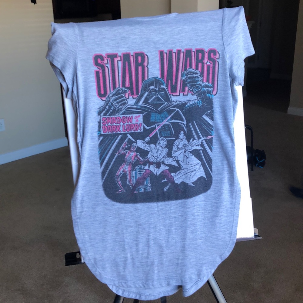 Official Star Wars retro design, size small super cute , slits up the side 😏